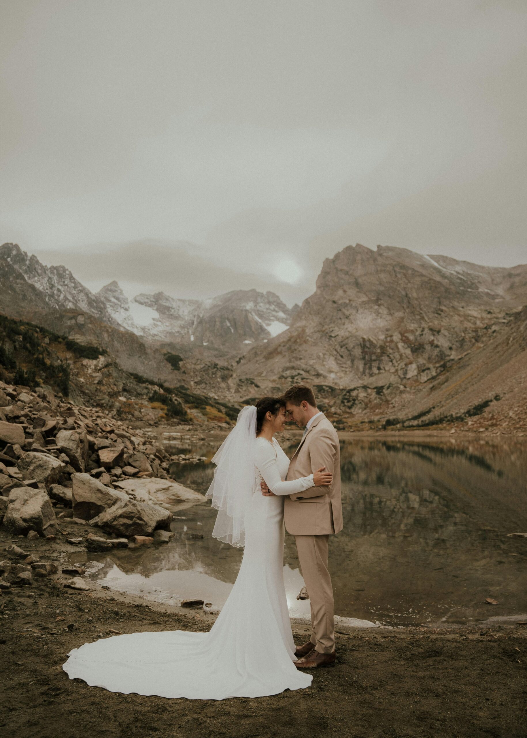 Couples embrace during San Juan Mountains elopement